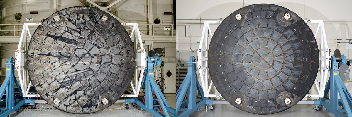 Two round Orion heat shields side by side on stands inside a NASA facility, the Artemis I shield on the left and the Artemis II shield on the right